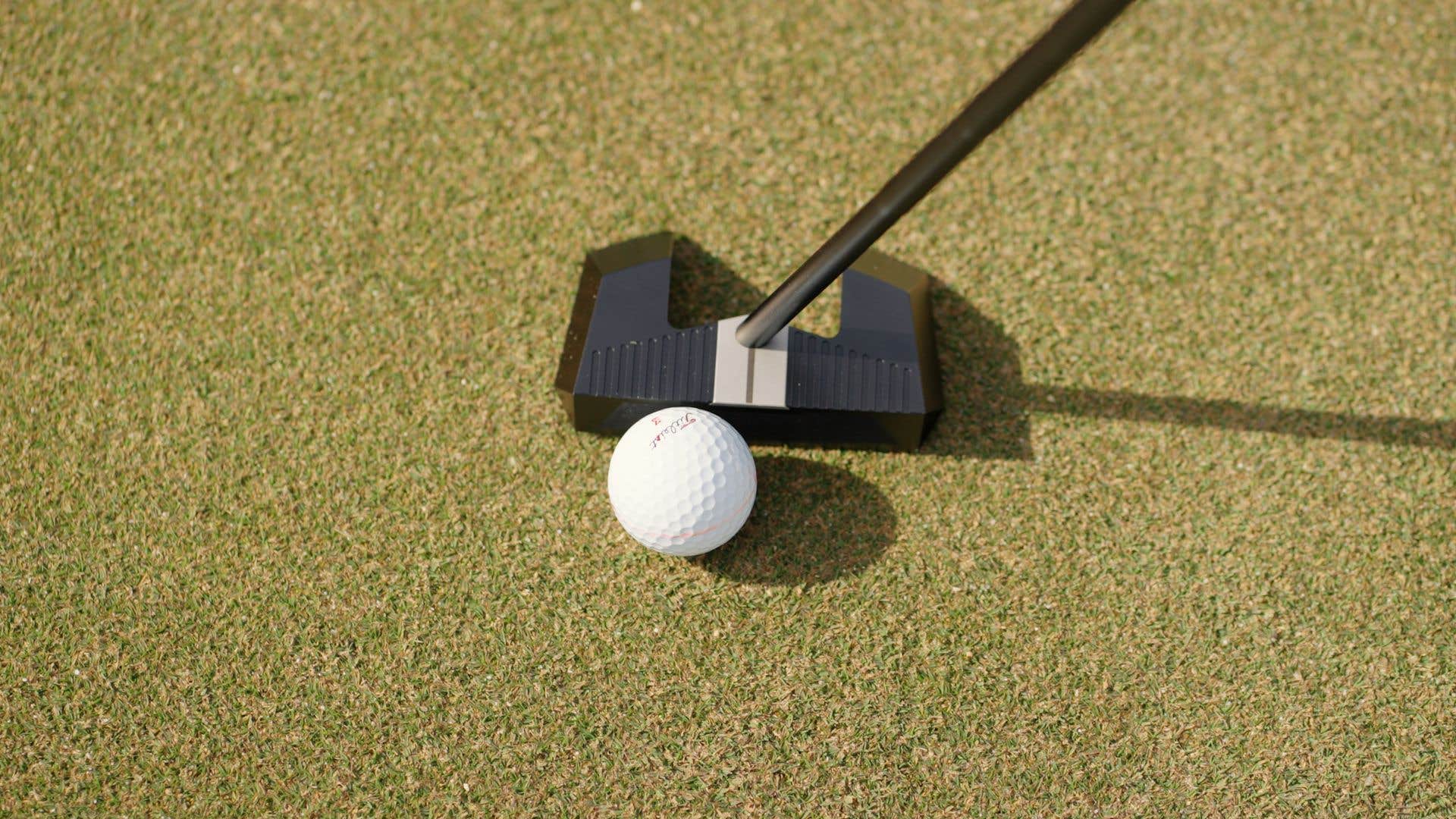 Play downhill putts like this for more control