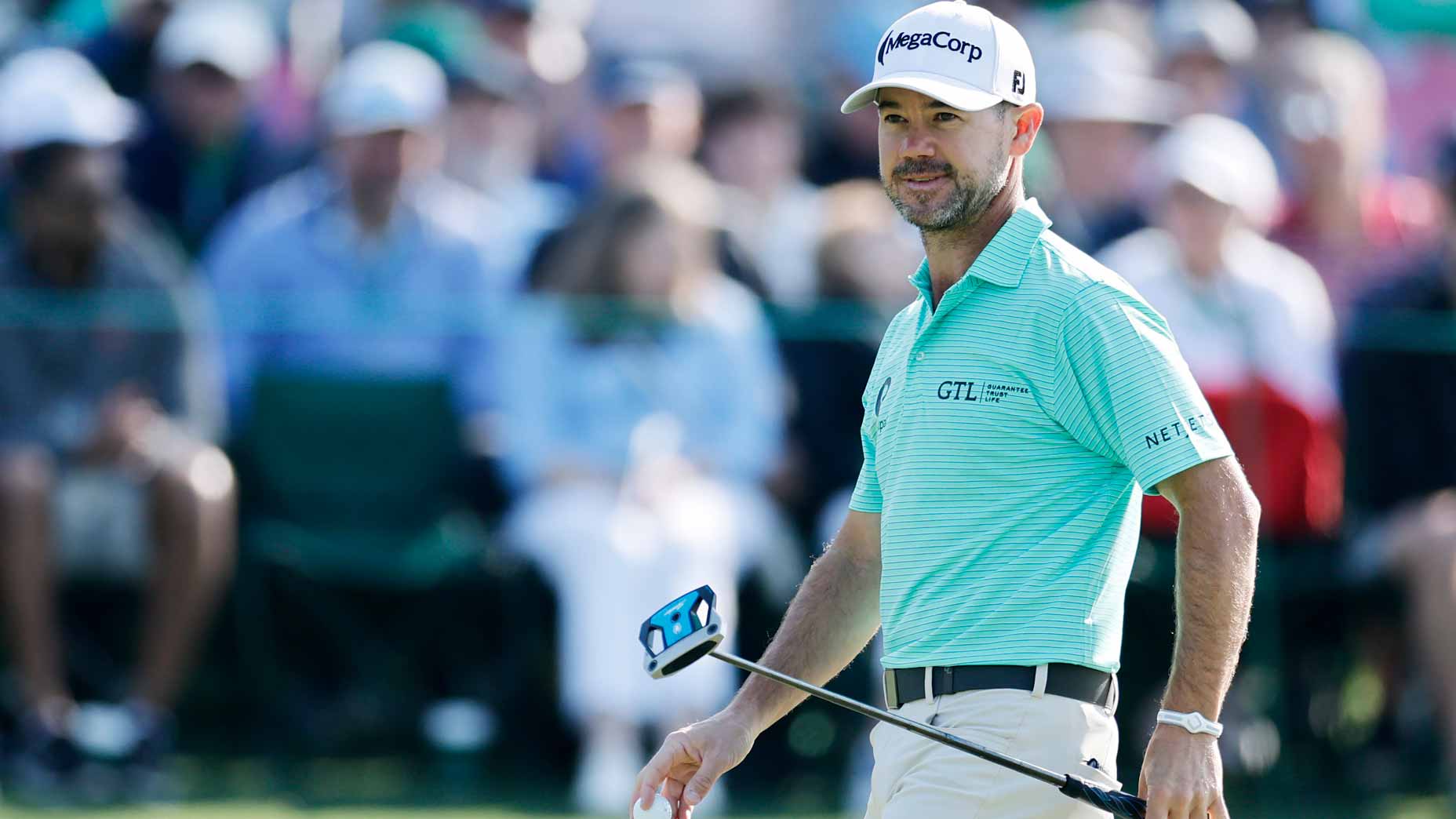 Brian Harman reacts after making a putt at the Masters.