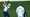 Bryson DeChambeau hits balls at the Masters range.