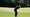 dustin johnson swings wedge during 2025 masters tournament