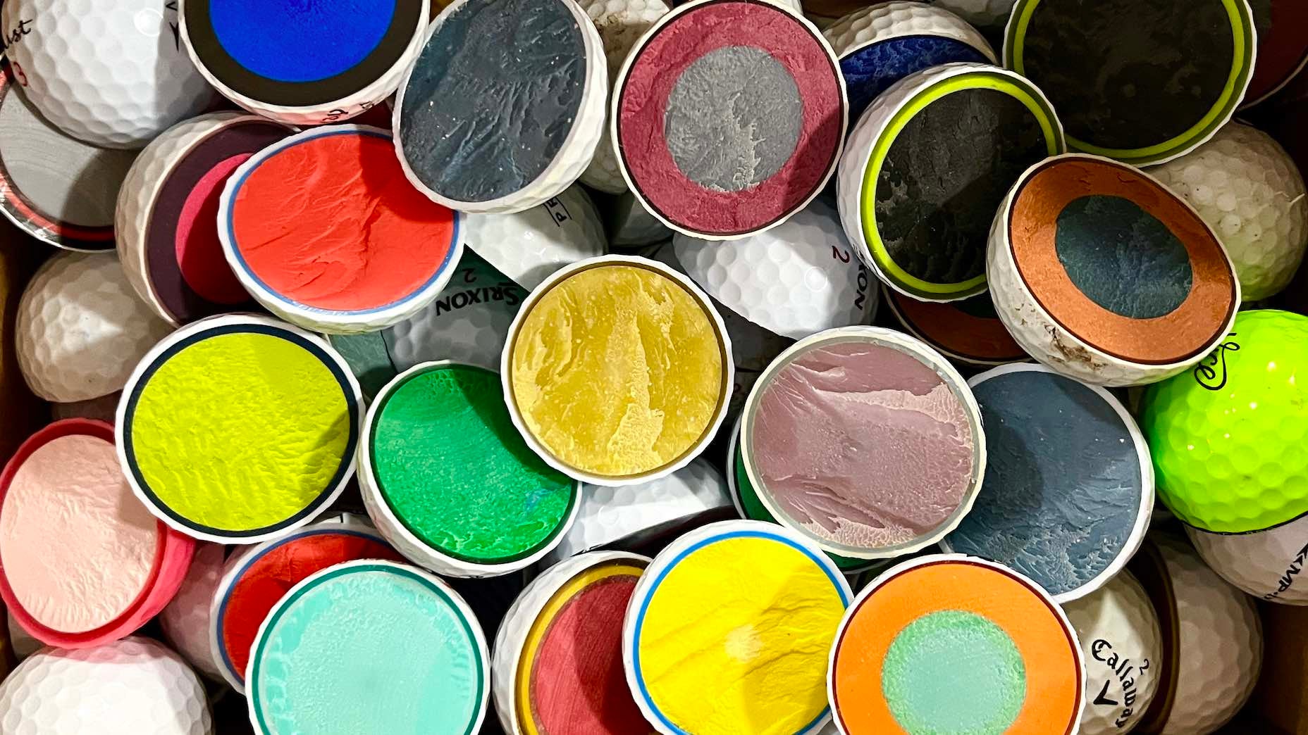 Golf balls cut in half cores