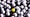 A group of white golf balls with one yellow golf ball, all of which weigh no more than 1.62 ounces.