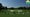 players hit balls on the range ahead of the 2025 masters