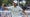 min woo lee fist pumps at the Houston Open in gray shirt and white hat